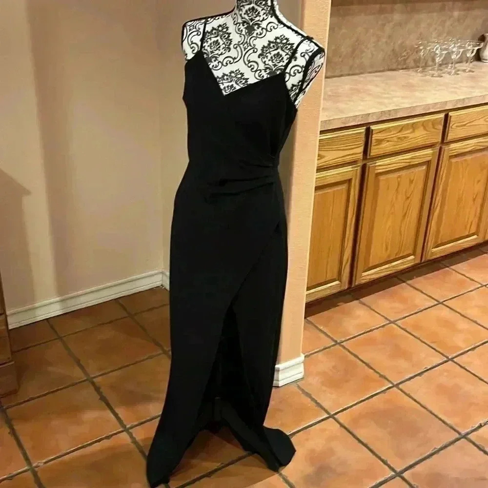 Windsor medium maxi formal dress with a slit Pit to Pit 17” stretches to 22”